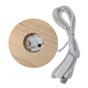 Tr�fod med farveskiftende LED lys . 8 x 2 cm