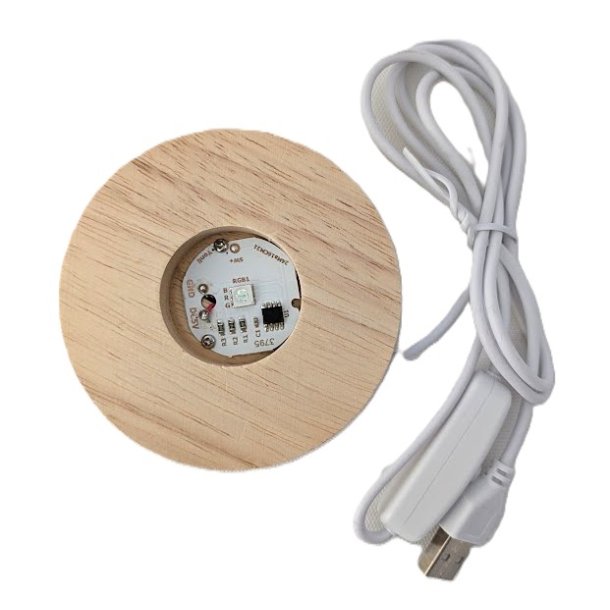 Tr�fod med farveskiftende LED lys . 8 x 2 cm